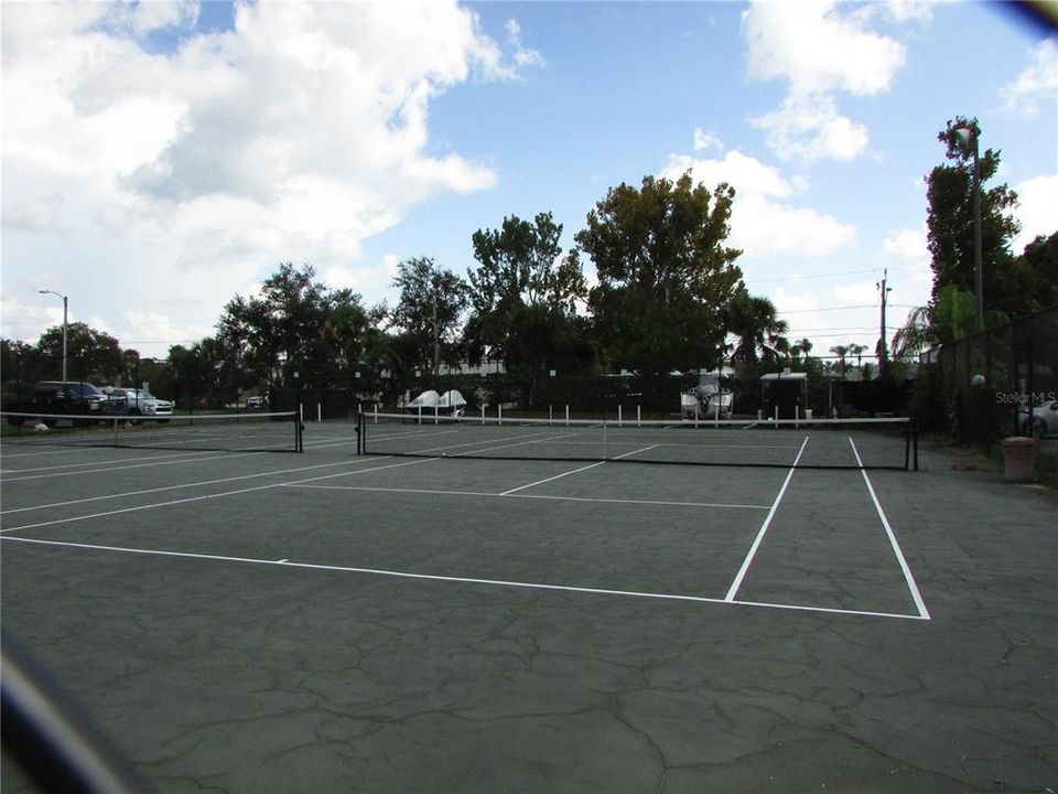 Tennis courts were just resurfaced.