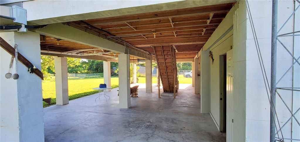 First floor could be used for boat storage, golf carts, vehicles. or shaded sitting area.