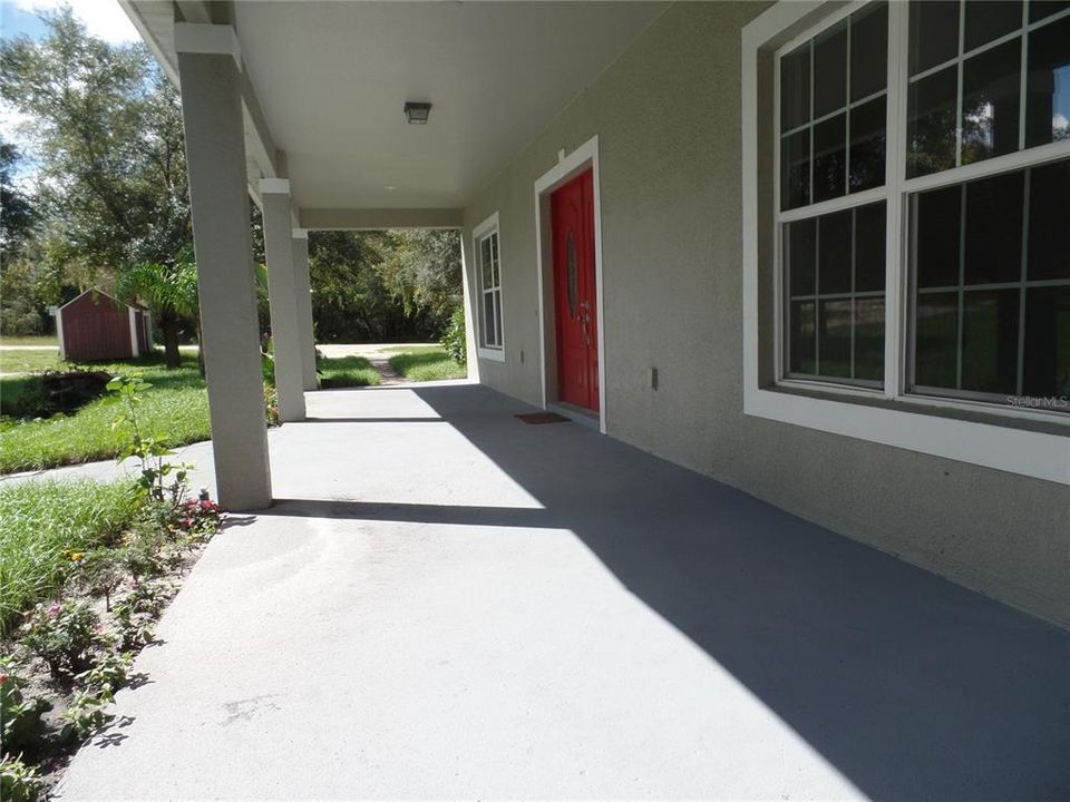 Expansive covered front porch.