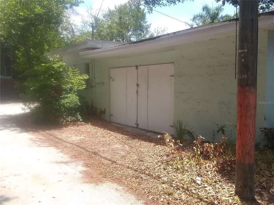 Large garage with barn door style doors