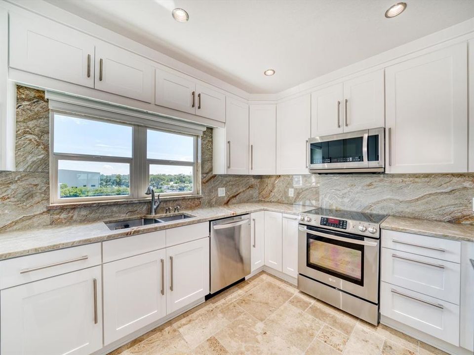 Fully equipped kitchen with views of the Intracoastal.