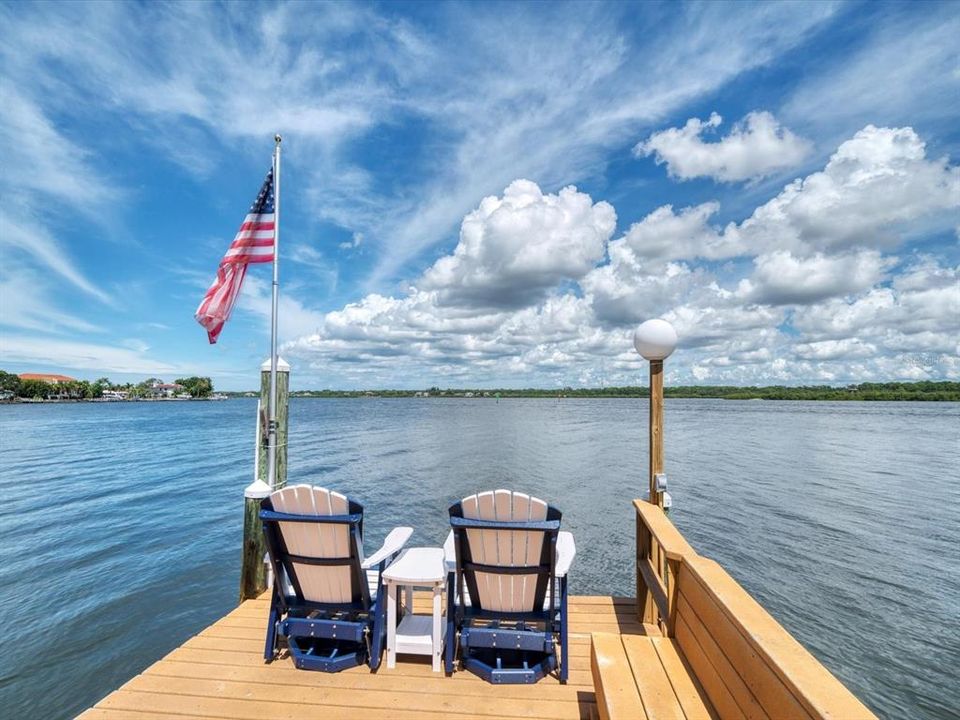 Imagine...enjoy the view from your own front seat. Dolphins playing, fish jumping and occasional manatee sightings-you will never want to leave this gorgeous home.