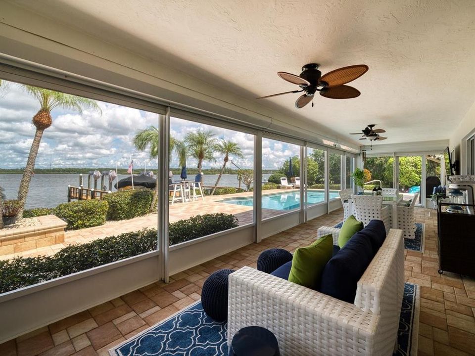 Separate seating area in  approximately 400 square foot lanai-an added bonus as well as  electric storm shutters!