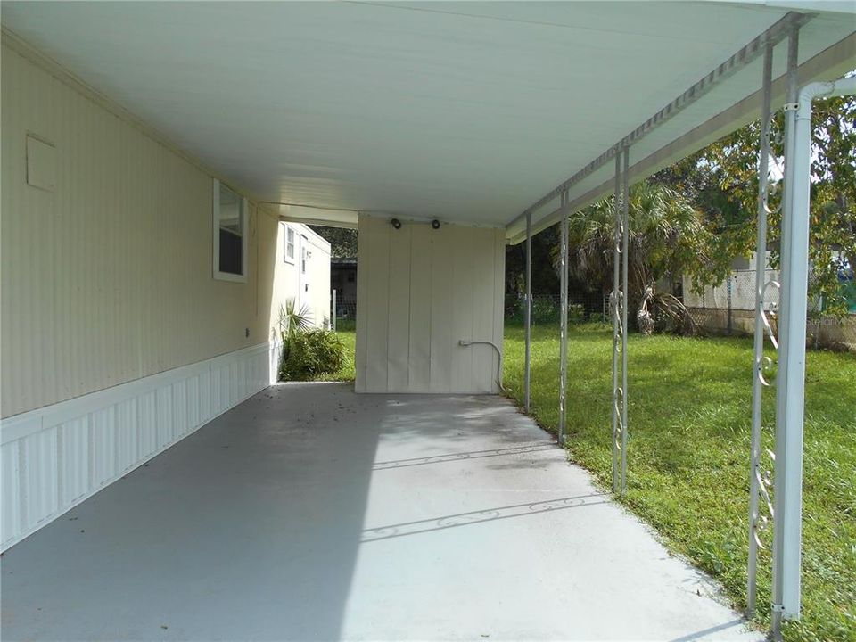 Workshop has washer / dryer hookup.  Long carport has room to cover two cars