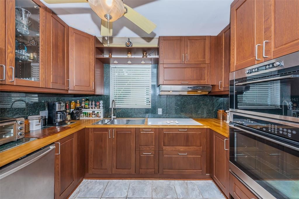Updated Kitchen with Customized Wood Cabinets