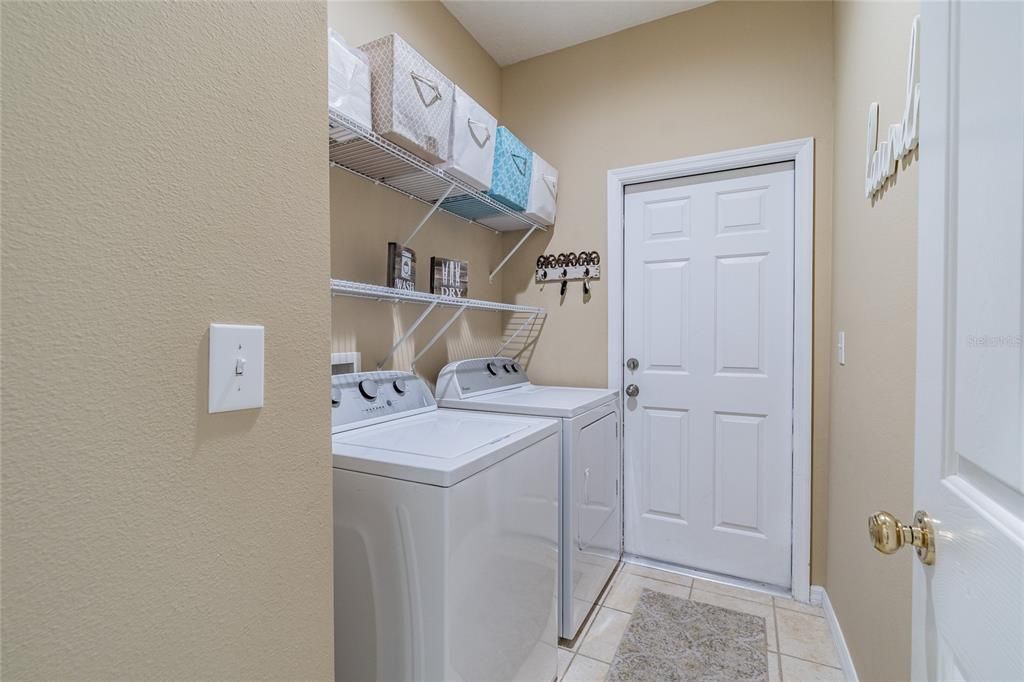 Laundry room with washer and dryer included