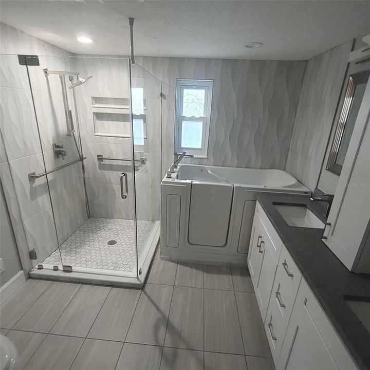 Master Bathroom Remodeled - double sinks granite counter tops and expensive walk-in bath
