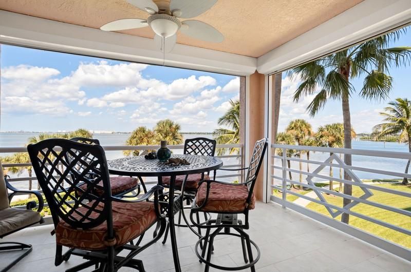 Large private balcony over the water from the Living area