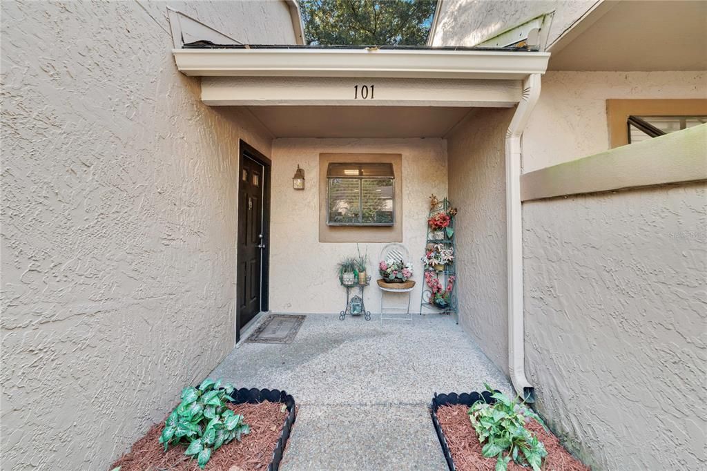 A lovely front porch welcomes you home.