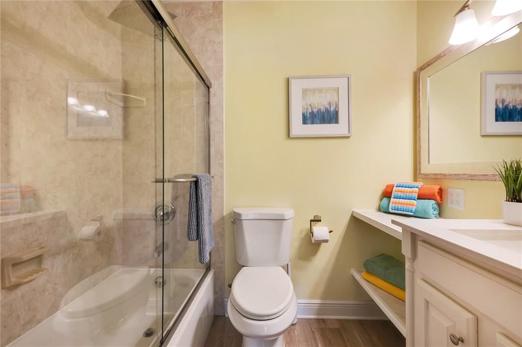 The main bedroom ensuite also features a tiled shower stall.