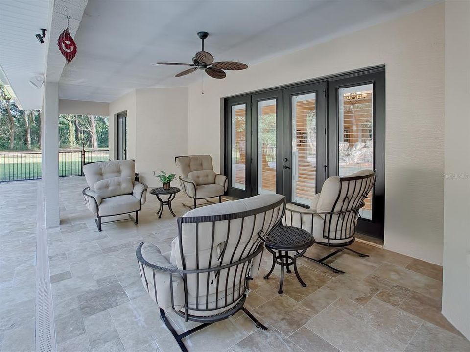 THIS COVERED PATIO IS THE PERFECT PLACE TO ENJOY MORNING COFFEE OR A BEAUTIFUL SUNSET!