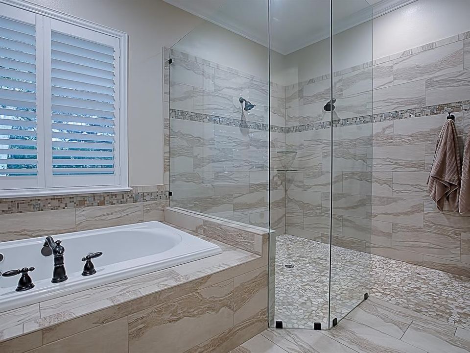 YOU CAN'T BEAT THIS FOR BEAUTY AND LUXURY IN A MASTER BATH!  NOTE THE DUAL SHOWER HEADS