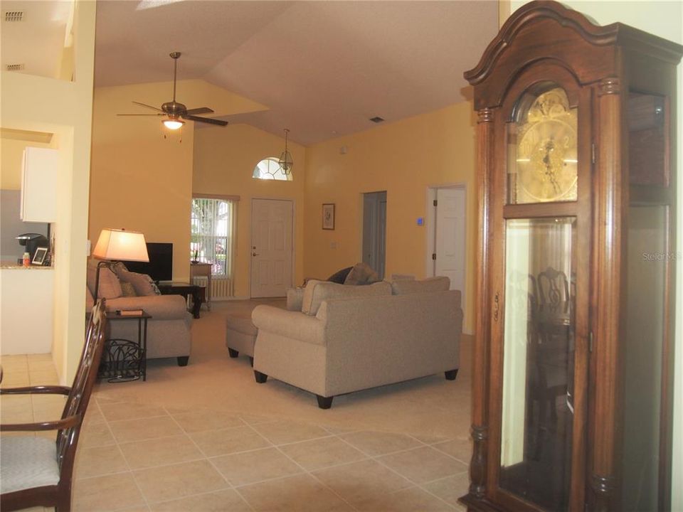 Living room to view to entry foyer