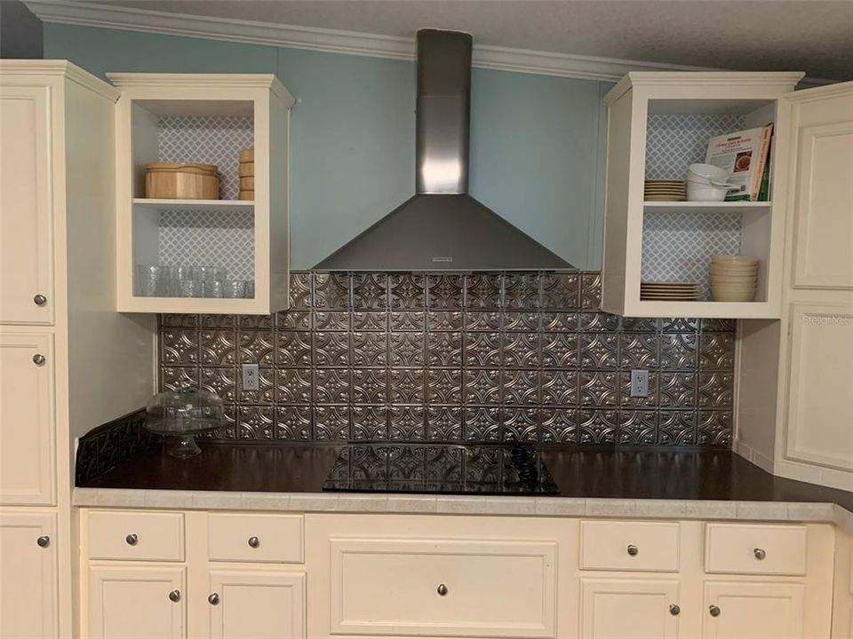 Decorative range hood and range top