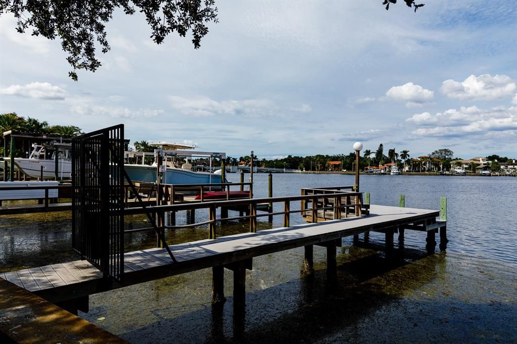Dock has water and electric is available but not currently connected. No bridges to open waters of Tampa Bay