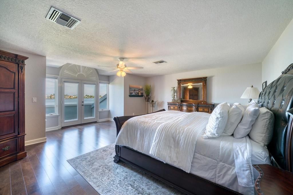 Upstairs master suite is refreshing! Exquisite views and access to balcony.