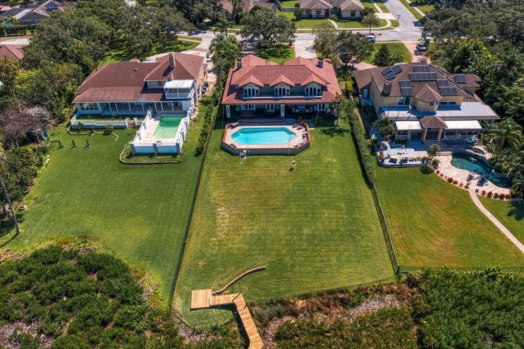 With approximately 3/4 acre, depth of the property extends approximately 300 foot with 93 foot of natural coastline.