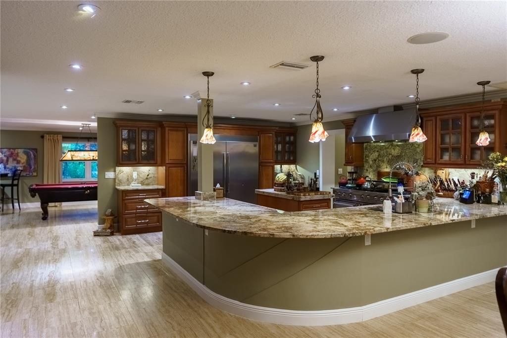 The counter top is ONE piece of granite and matches the back splashes in the kitchen
