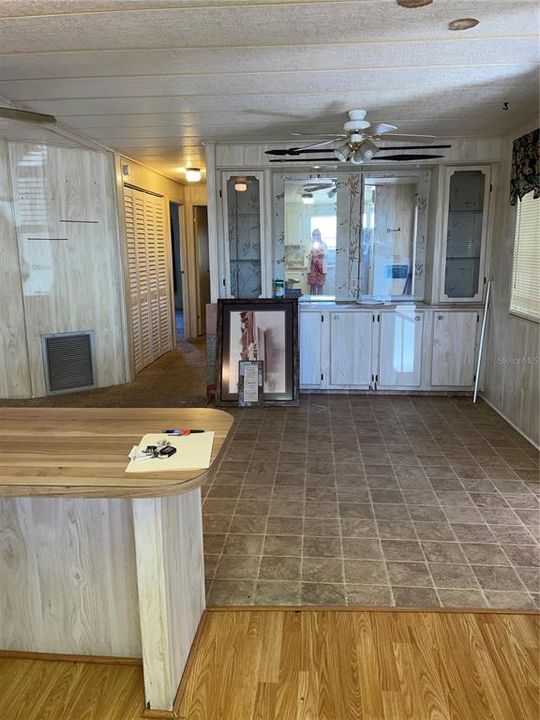 View from kitchen to Dining room with builtin display case