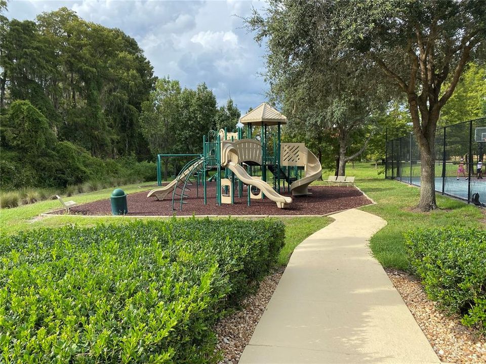 Playground at club house basket ball courts to the right