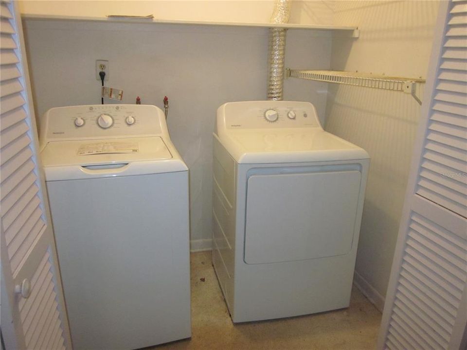 INSIDE UTILTY AREA WITH NEWER WASHER & DRYER