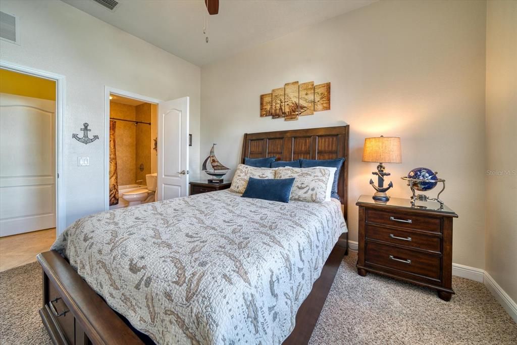 Guest bedroom on 2nd level includes private entrance to bath and a large walk-in-closet.
