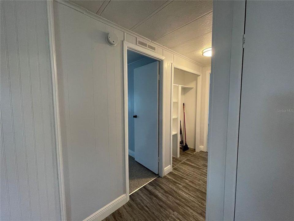 Hallway with large linen closet