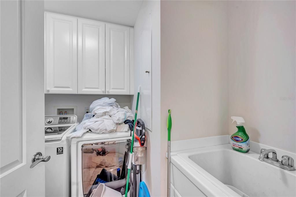 laundry room with washer/dryer AND sink, tenant is moving out as you can see...