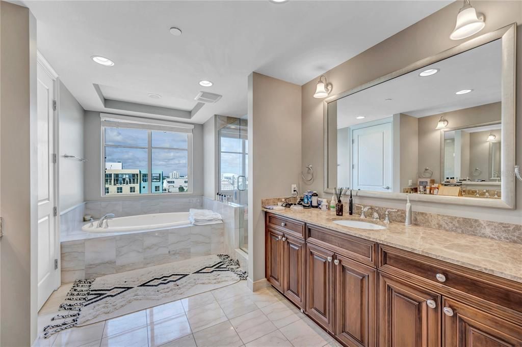 Part view bathroom to tub and shower