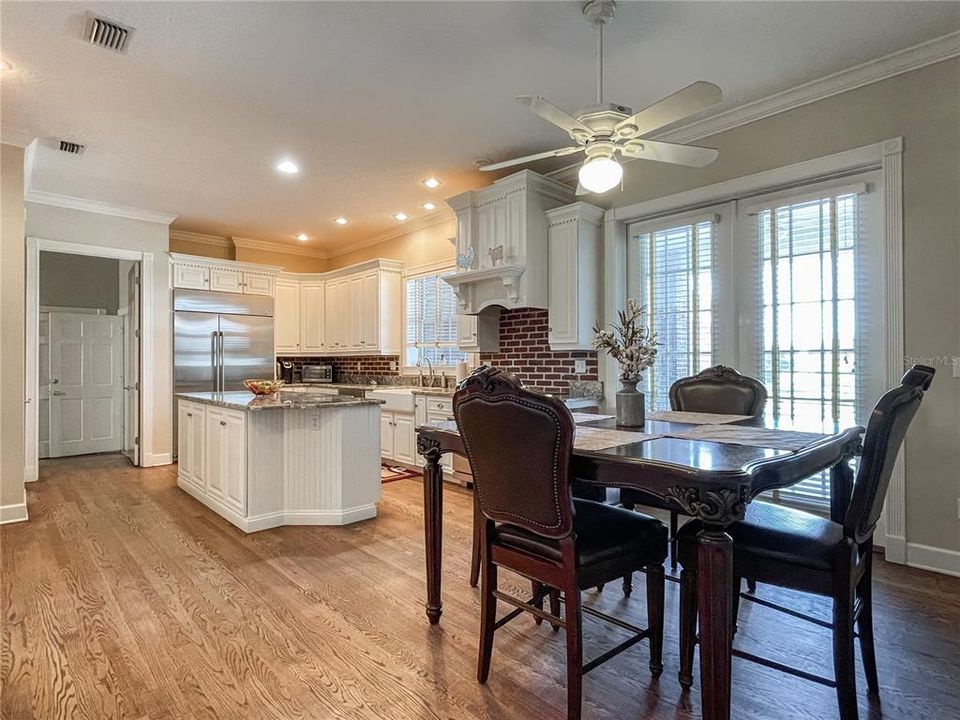 View from dinette into kitchen and utility room