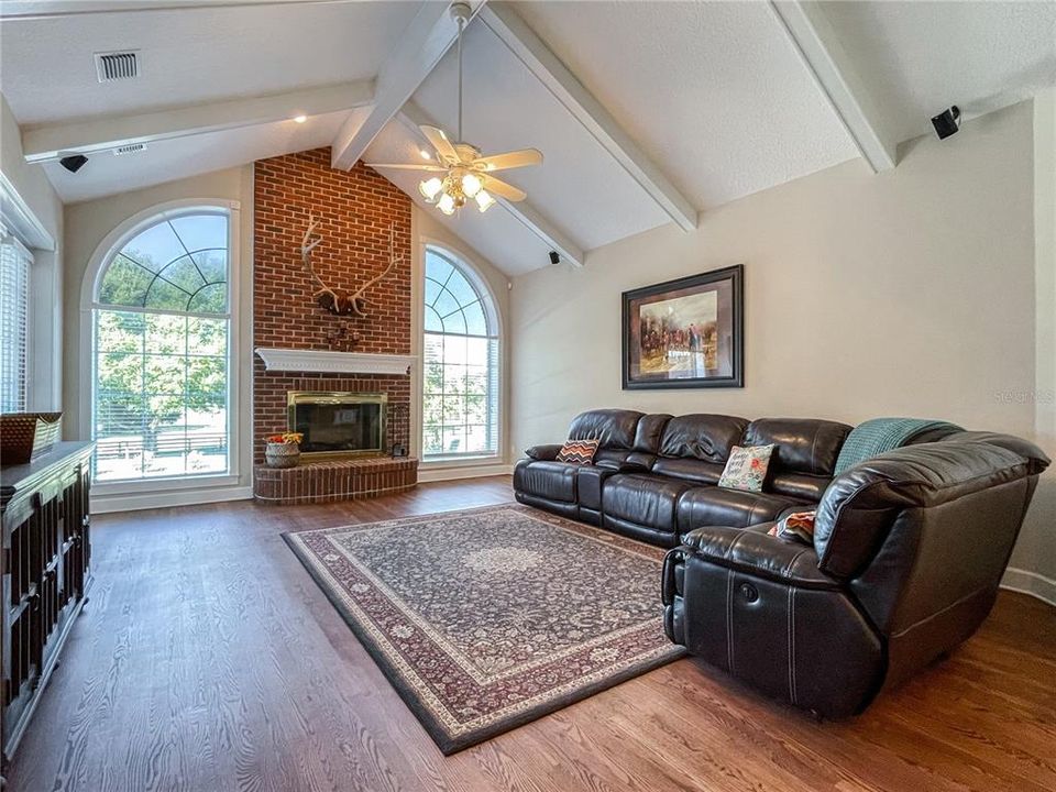 Cozy family room with wood burning fireplace