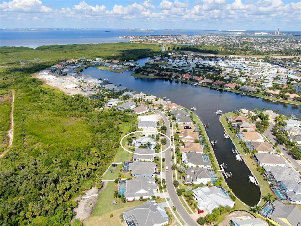 MiraBay on Manns Harbor Drive is an incredible place to live.  You will be living in a well maintained resort with a world class community center that is loaded with amenities and activities including a massive resort style zero entry pool with water features, slide and heated lap pool. Enjoy kayaking, fishing or paddle boarding on the 136 acre man made lagoon.  Five lit har-tru tennis courts, pickle ball, basketball, parks, playgrounds, extensive modern gym with machines and free weights.  Minutes to schools, shopping, hospitals, and restaurants.  Less than 1 hour to Tampa International Airport. Just over an hour drive to Orlando and Sarasota.