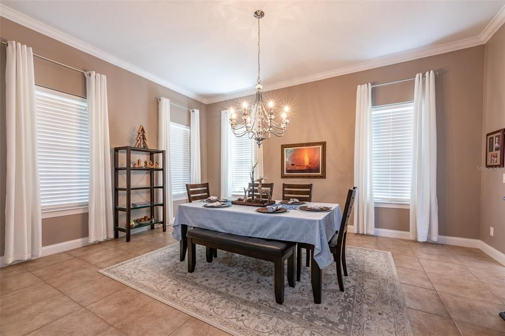 Beautiful formal dining room large enough for entire extended family or entertain your friends measuring 16x21. Tall ceilings throughout measuring almost 10 feet.