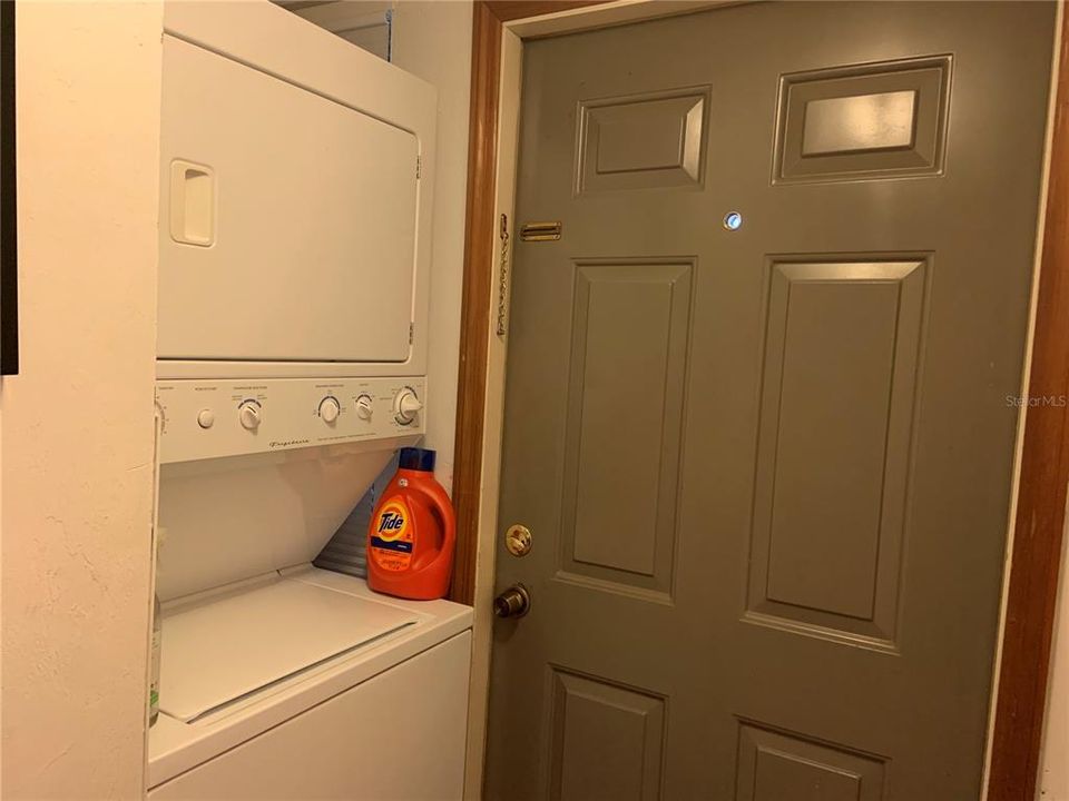 Stacked washer/dryer closet downstairs