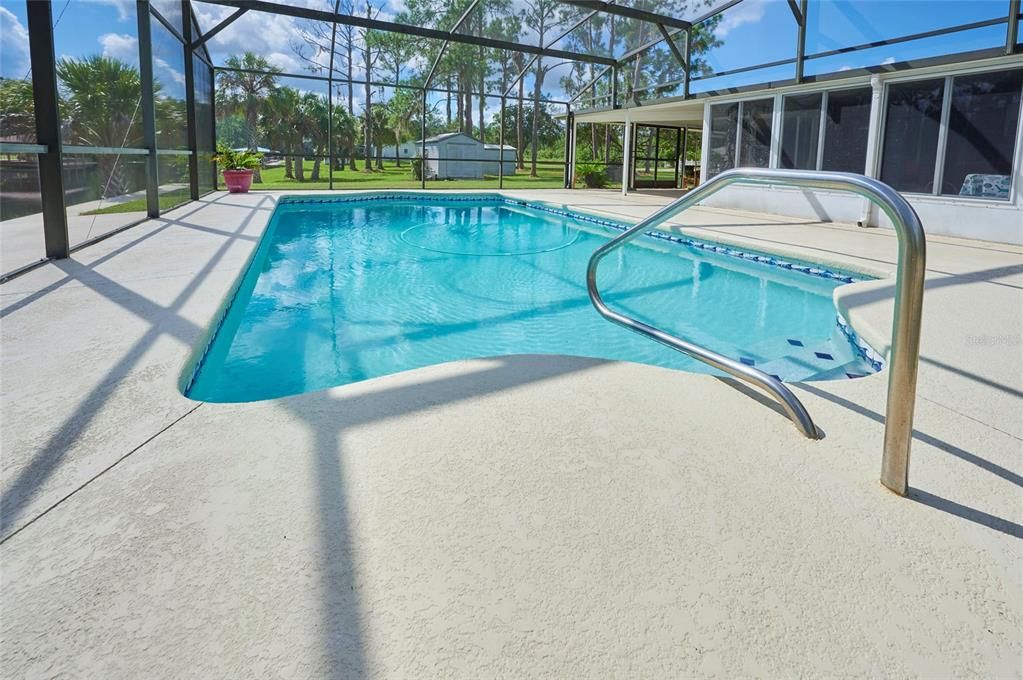 The screened lanai and pool will be a favorite spot on those long Florida summer days!