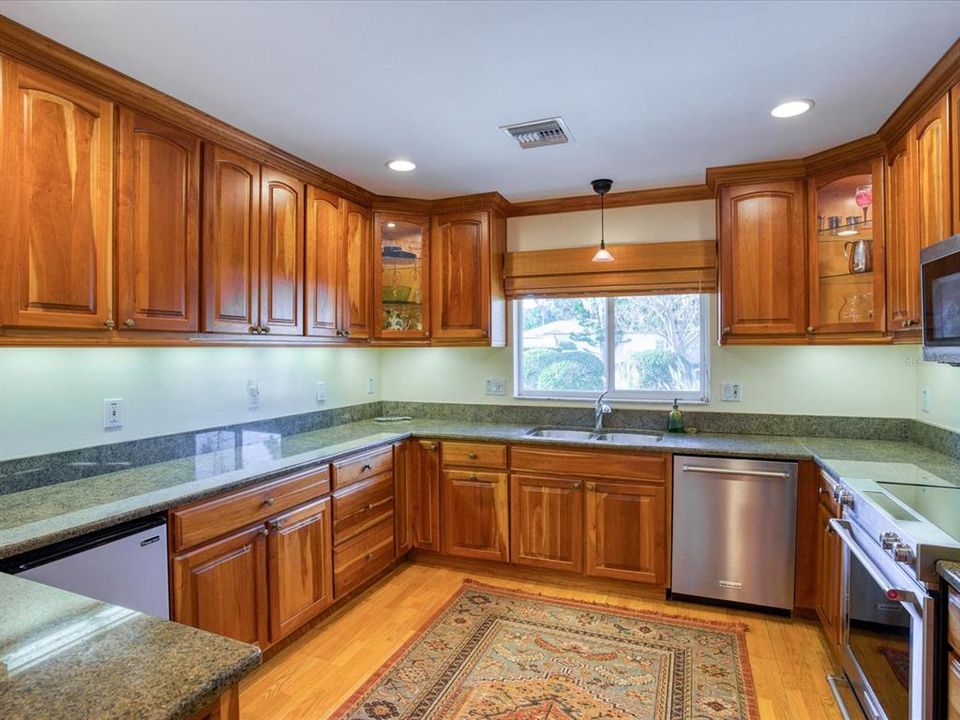Open Kitchen with elegant Granite Counter Tops for Cooking and Entertaining