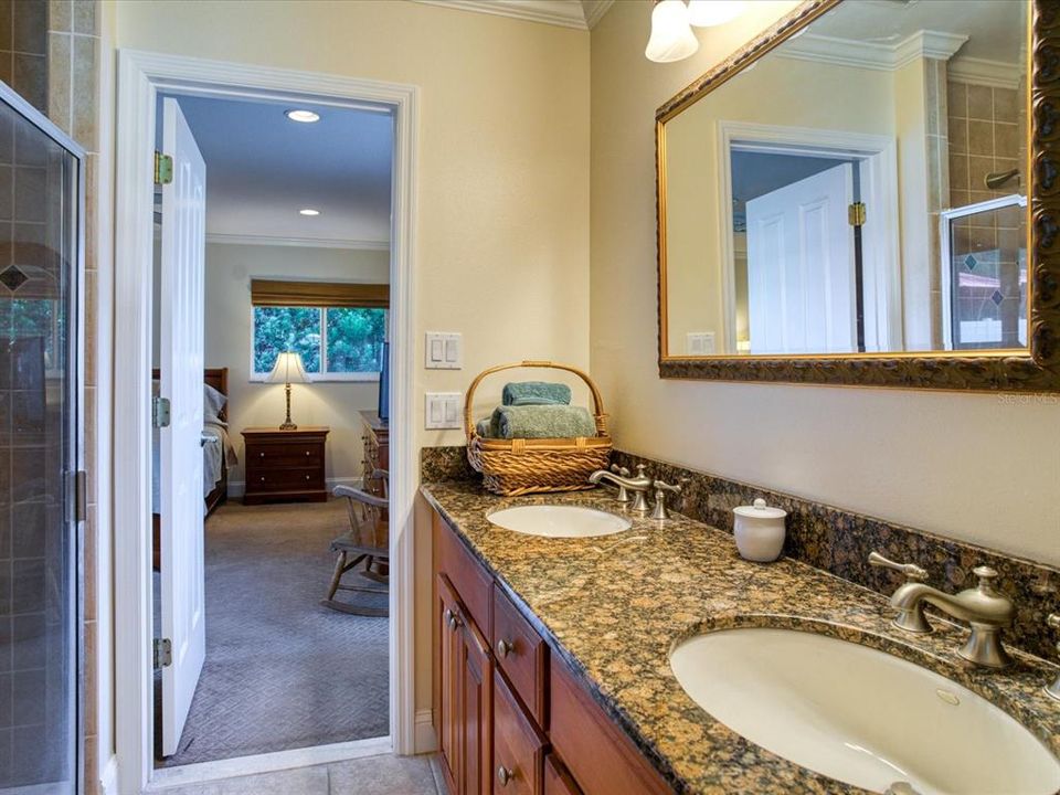 Bath for Private Suite has Tub and separate Shower, Granite Counter tops and Access to Pool