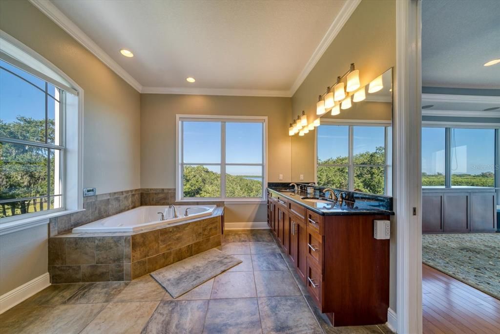 Master bath is tastefully done and includes a walk in shower.