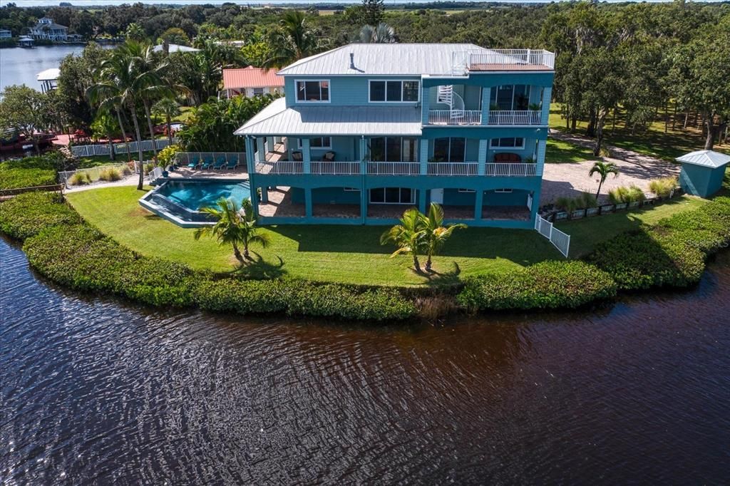 Balconies on all all floors and Captain's deck on the roof offer great outside living, watch the manatees gliding down the river....