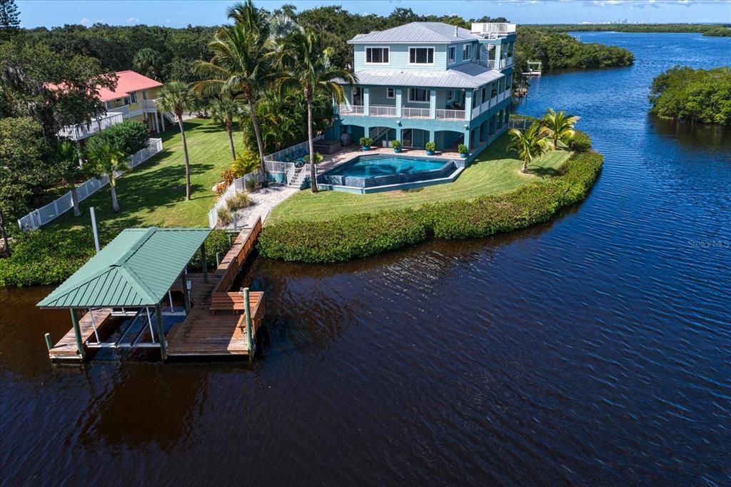 Easy access to your private covered dock with electricity, water and lighting.  Jet ski lift and boat lift!