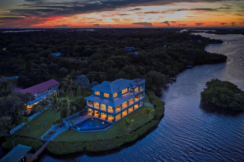 Total privacy along with peace and relaxation are yours in this stunning waterfront home.