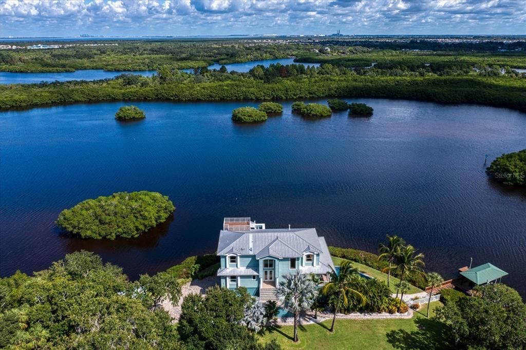 Aerial view showing this beautiful home and tranquil surrounding waters.