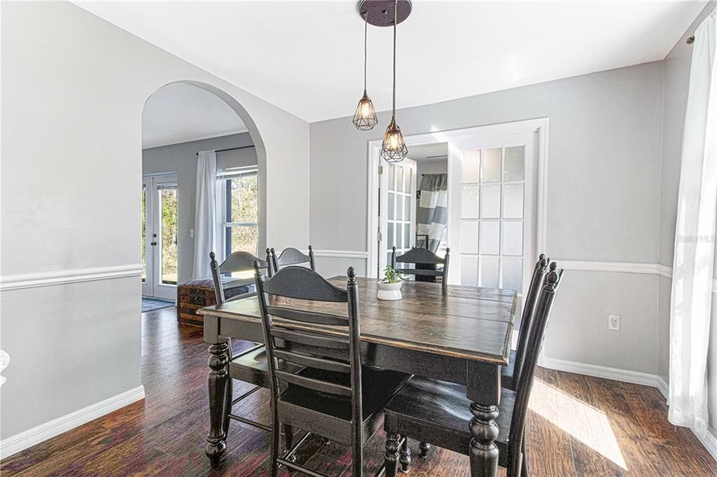 Dining room leading into office/flex space