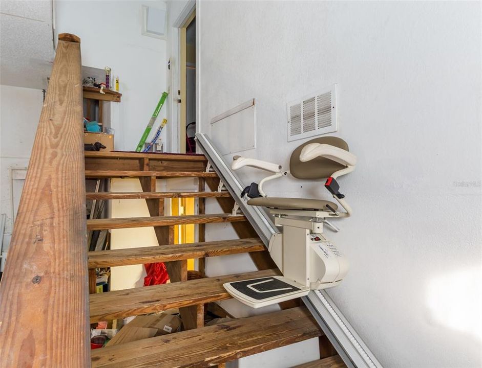 Stair glide to home from garage -- handicap accessible