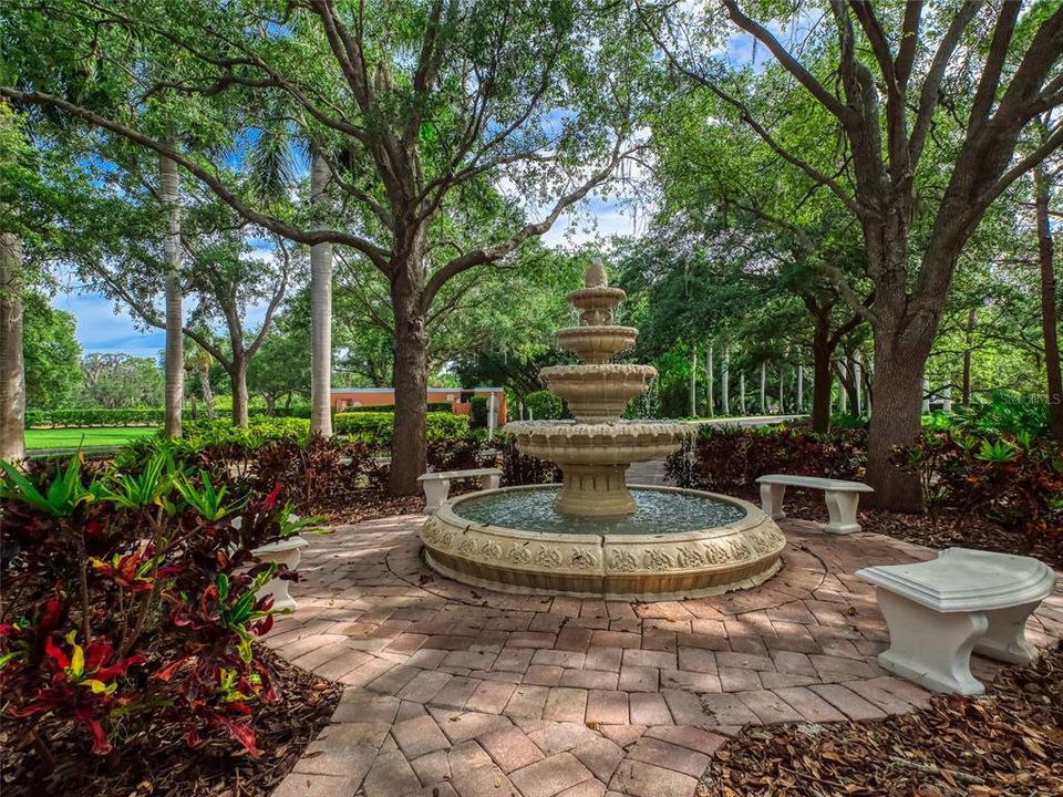 Bella Villino community entrance, featuring a fountain in front of the Clubhouse