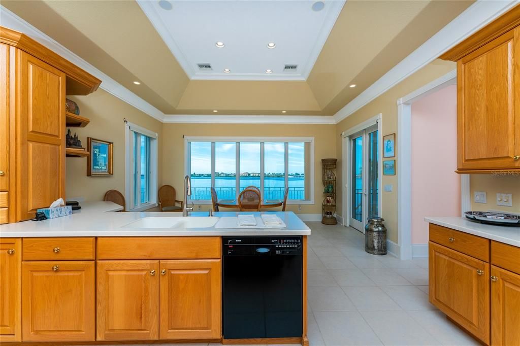 looking from kitchen toward breakfast nook and water view!