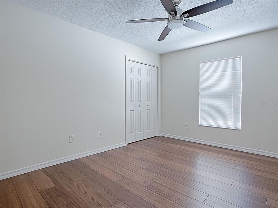 GUEST ROOM WITH ALL NEW LAMINATE FLOORING AND ALL FRESHLY PAINTED - NEW CUSTOM CEILING FAN!