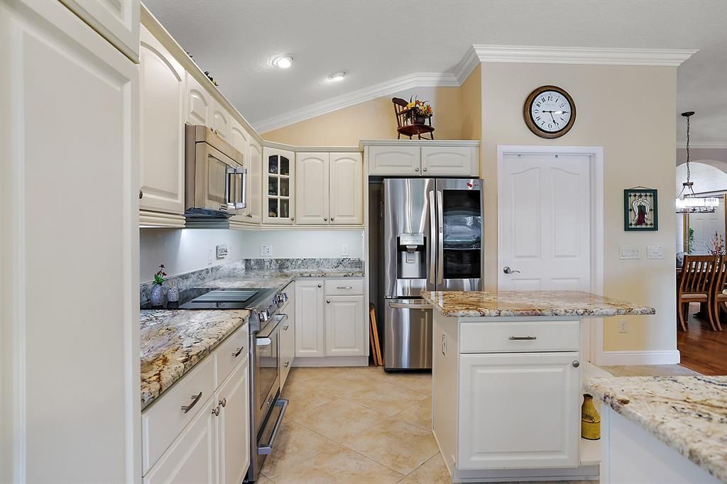 Kitchen with stainless appliances and tile flooring
