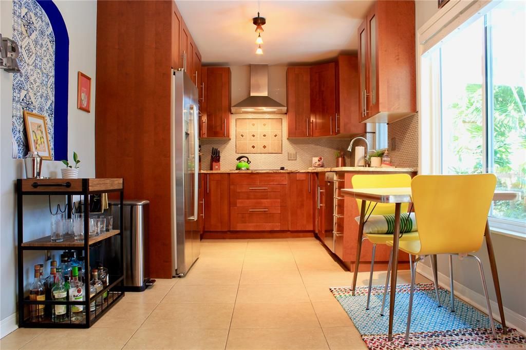 Updated appliances and functional kitchen space with plenty of storage!