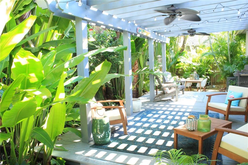 Lush tropical backyard living space!
